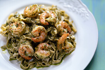 seafood pasta in pesto sauce