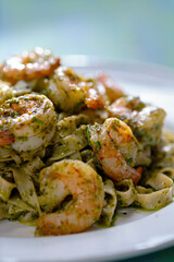 seafood pasta in pesto sauce