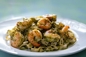 seafood pasta in pesto sauce
