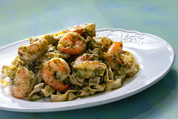 seafood pasta in pesto sauce