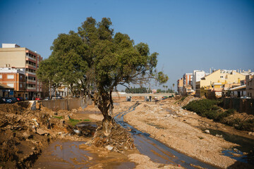 Paiporta, España; 11 30 2024: The aftermath of the DANA, one month later in Paiporta, showcasing flooded streets, damaged buildings, and debris-strewn landscapes.