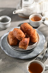 
Odading (Beignet) is a sweet, fried bread from Indonesia, with a soft, fluffy interior and slightly crispy exterior. Often enjoyed as a snack or breakfast with tea or coffee.