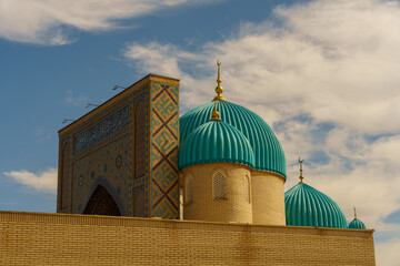 A blue dome on top of a building with a blue roof