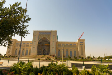 A large building with a blue and white facade