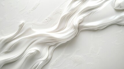 Obraz premium Smooth white wave pattern flowing across a minimalist white background, creating a calming abstract design