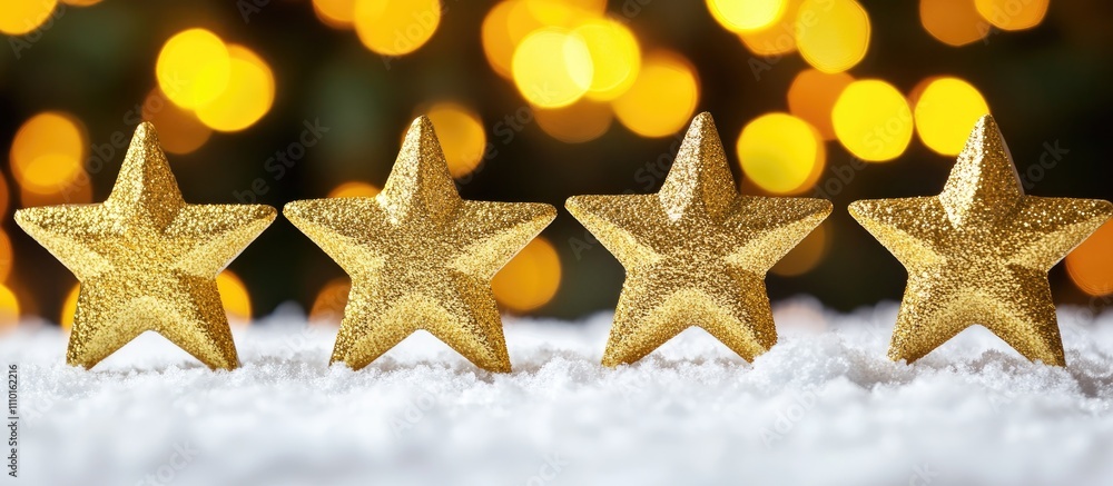 Aufkleber golden stars arranged on snow with a warm bokeh background creating a festive and cheerful atmospher