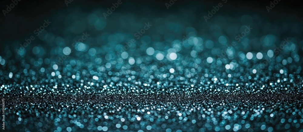 Poster abstract background featuring shimmering green glitter with a beautiful bokeh effect from out-of-foc