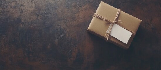 Elegant gift box with blank note on rustic wooden background for personalized gifting and holiday celebrations