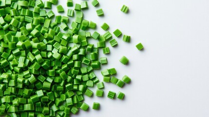 Green plastic masterbatch granules for industrial applications displayed on a white background suitable for product catalog or banner design.