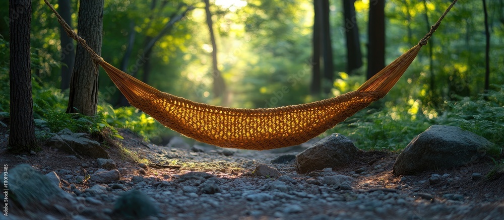 Aufkleber tranquil hammock suspended between trees in serene forest setting with dappled sunlight filtering th