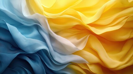 Obraz premium Colorful waves of flowing fabric in blue and yellow tones