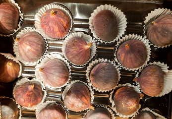 Figs in beautiful packaging on display in a supermarket