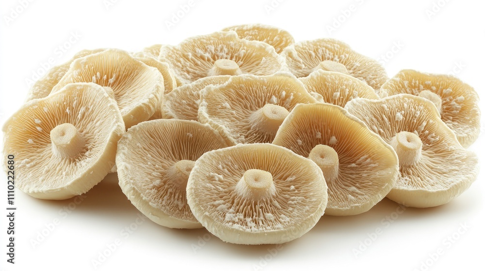 Poster sliced straw mushrooms arranged on a white background showcasing their unique texture and color for 