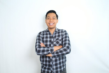 Fototapeta premium smiling asian man crossed arm show cheerful expression isolated on white background