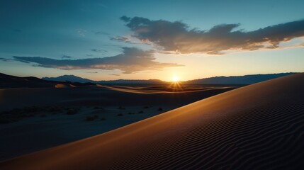 A desert landscape with a sun setting in the background