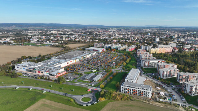 Supermarket residential buildings autumn fall warehouses drone aerial stock building construction and shops, occupation annexation field Olomouc, civilizational problem of a sustainable life Europe