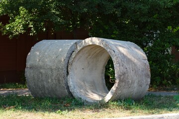 Two concrete rings lying in the street