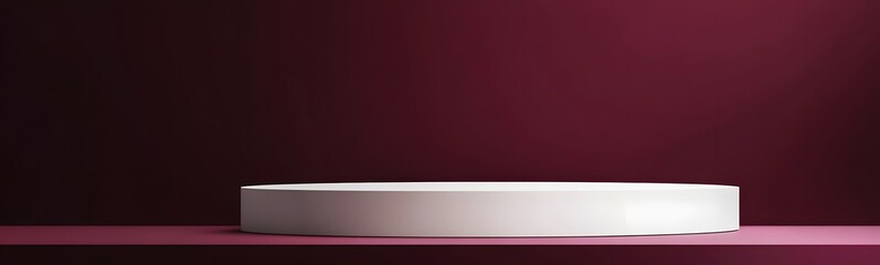 Obraz premium Smooth white podium with clean edges, set against a rich, deep burgundy background with empty space to feature a product.
