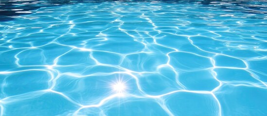 Obraz premium Glistening sunlight reflections dancing on tranquil blue ocean water surface creating a serene and captivating aquatic scene