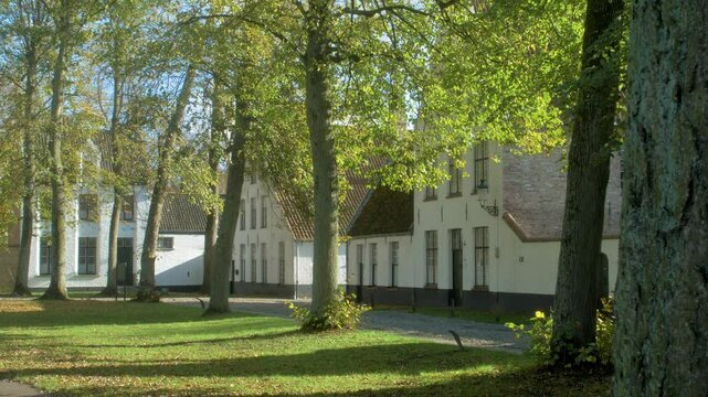 Bruges Beguinage, must see site of Belgium in autumn, when time feels suspended. Unesco World Heritage listed historic city. Europe top destination.