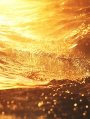 Warm sea water splashing dark sand beach at golden sunset evening. Closeup calm ocean waves breaking on summer coast at orange sunrise morning. Yellow sunlight reflecting sea waves. Nature background