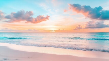 Obraz premium Travel image with a beautiful sunset over the ocean, with pastel clouds in the sky and sand on the beach