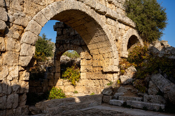 Rows of columns in Perge, Antalya, Turkey. Remains of colonnaded street in Pamphylian ancient city.Rows of columns in Perge, Antalya, Turkey. Ancient Kestros Fountain. Aksu, Antalya