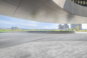 Empty brick floor background in modern city