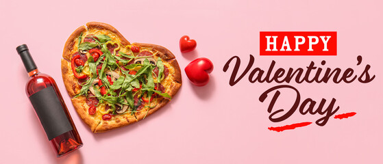 Tasty heart shaped pizza with arugula and bottle of wine on pink background