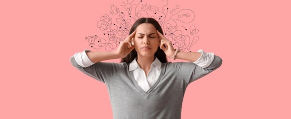 Stressed young woman on pink background