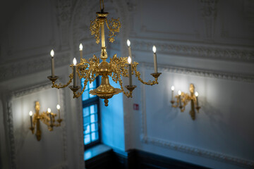 Gilded chandelier in the wedding hall