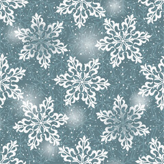 Vector seamless pattern with snowflakes and white spots on a blue background. Christmas and New Year design