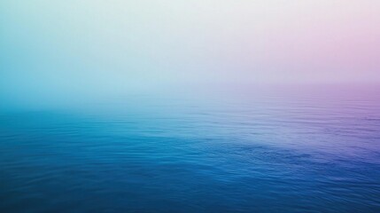 Obraz premium A gradient background blending blue and purple tones, creating a smooth and calming transition between colors.