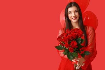 Beautiful young woman with kiss marks on her face holding bouquet of roses and heart shaped air balloons on red background