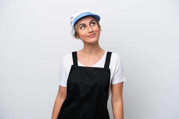 Fishwife woman isolated on white background thinking an idea while looking up