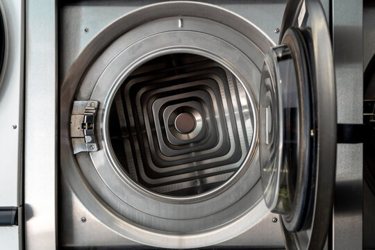 Inside view of modern industrial washing machine drum
