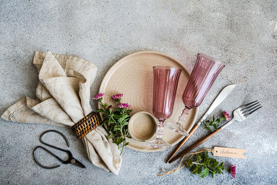 Rustic autumn table setting with flowers and vintage elements