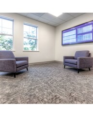 Fototapeta premium Modern office waiting area with comfortable seating