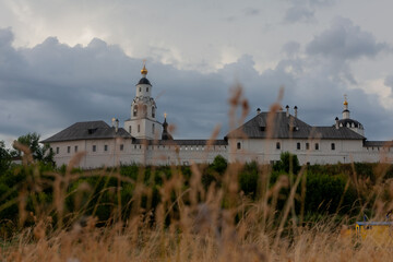 Witness the architectural marvels of Sviyazhsk as clouds gather over this historic site surrounded by nature.