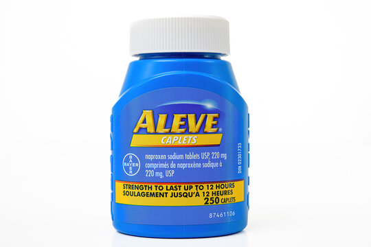 A plastic bottle of Aleve pills.