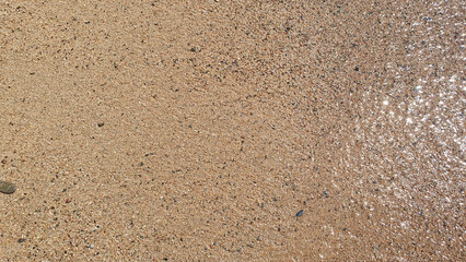 Much sand in the sea, river, lake, ocean water. Nature background.