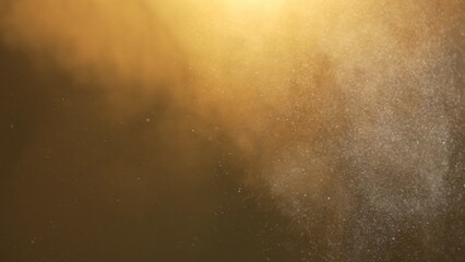 Many dust particles floating in white smoke cloud warm light on empty background with spotlight from above.