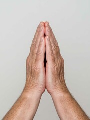 Fototapeta premium Prayer Hands in Soft Golden Light