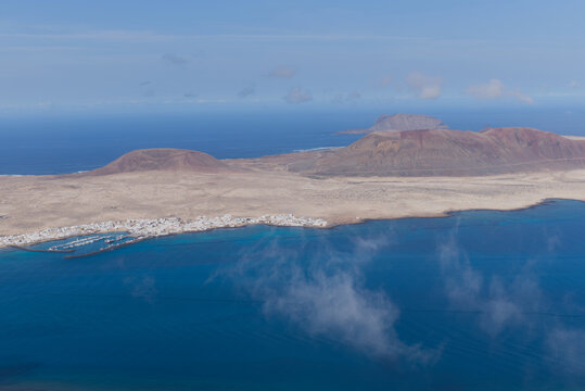 La Graciosa Island in the Canary Islands and the main town of Caleto Del Sebo, photo from the viewpoint of Mirador Del Rio.
