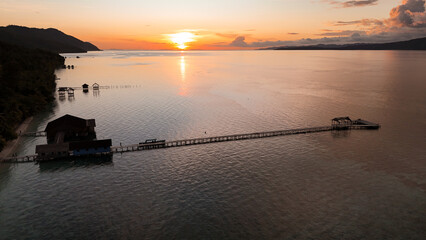 Sunset Over the Water Village