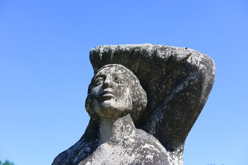 Old sculpture of a woman