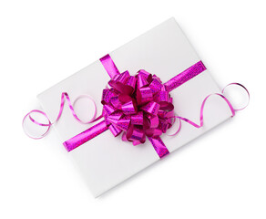 One book with purple bow as gift isolated on white, top view