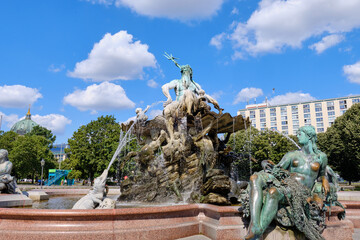 19 August 2024 Berlin (Germany) - August: Neptune fountain (Neptunbrunnen) on Alexanderplatz square.
