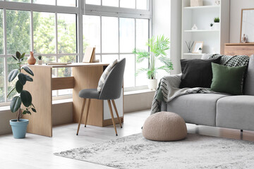 Cozy sofa and table with chair in living room