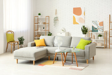 Modern electric fan on coffee table at home